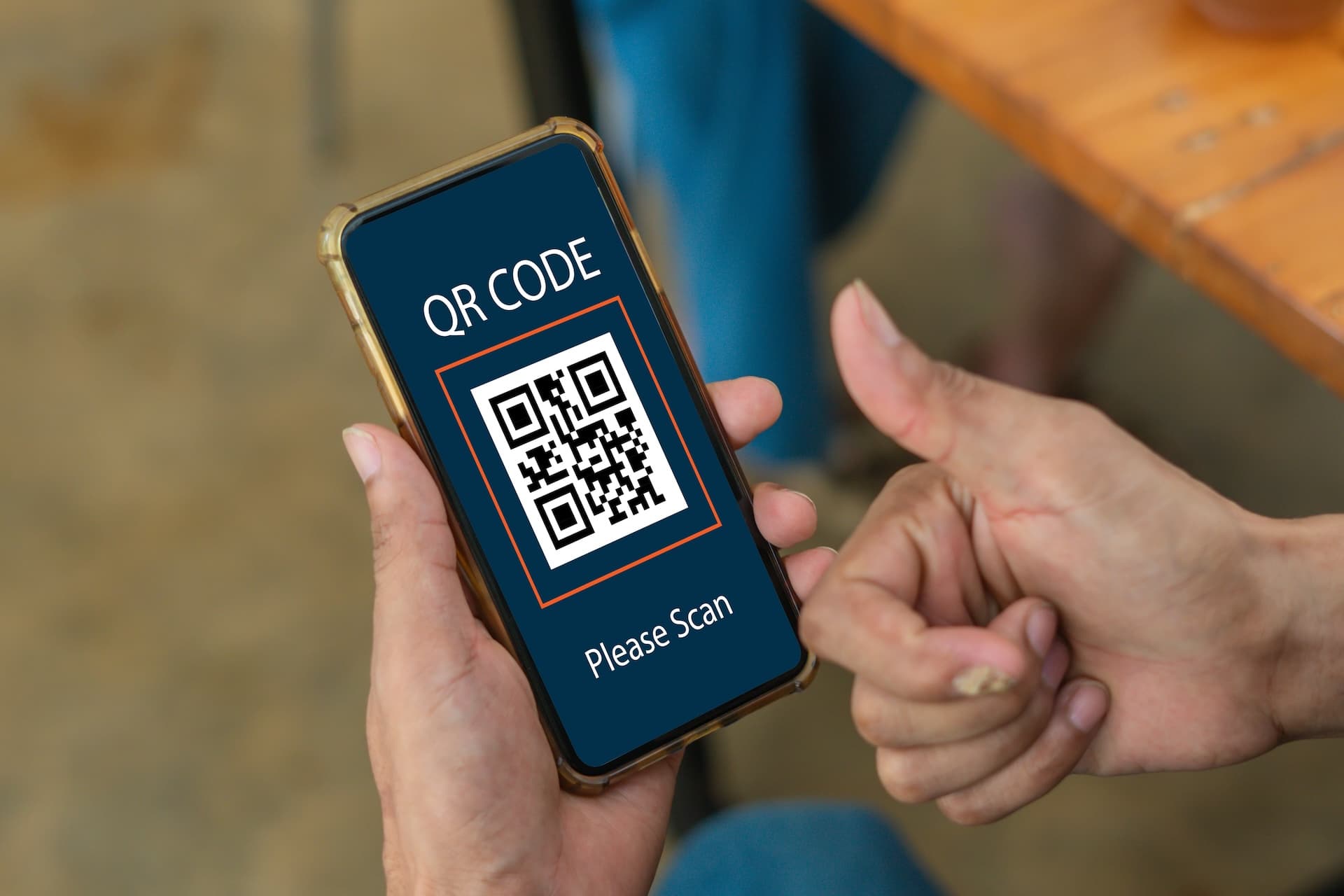 Customer scanning a QR code on a phone